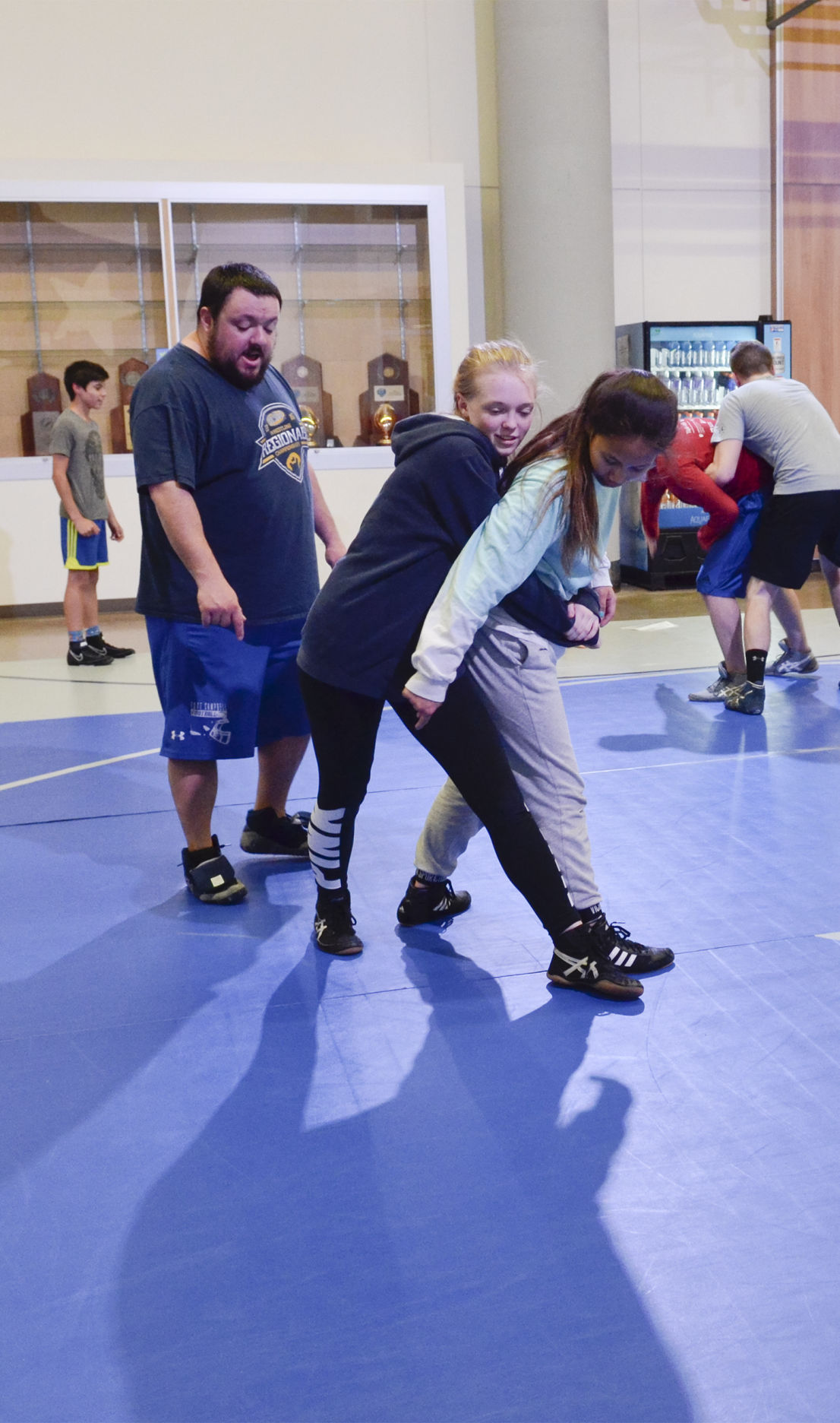 12 FCHS girls pave way to future: Falcons form first all-female wrestling team in school history