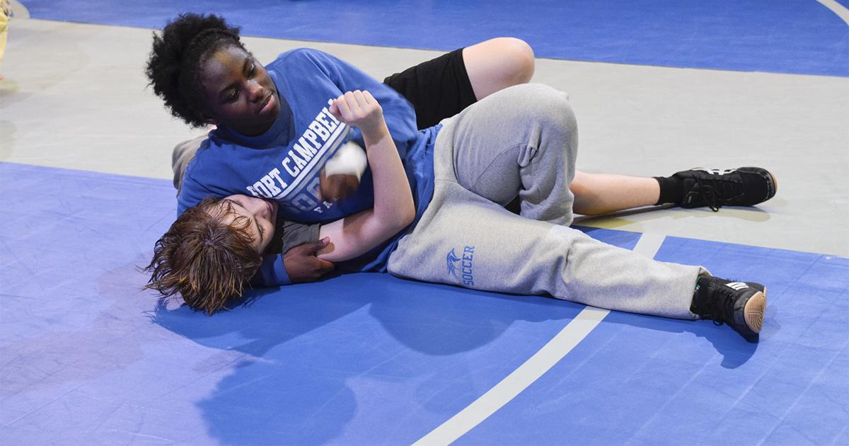 12 FCHS girls pave way to future: Falcons form first all-female wrestling team in school history